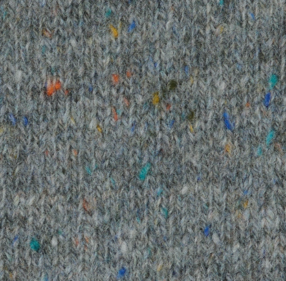 Elegant iDOKNiT SESIA SCOTLAND 100% Extrafine Merino Tweed lace yarn in Nm 2/14, showcasing a sophisticated rustic speckled texture and premium Italian wool quality.