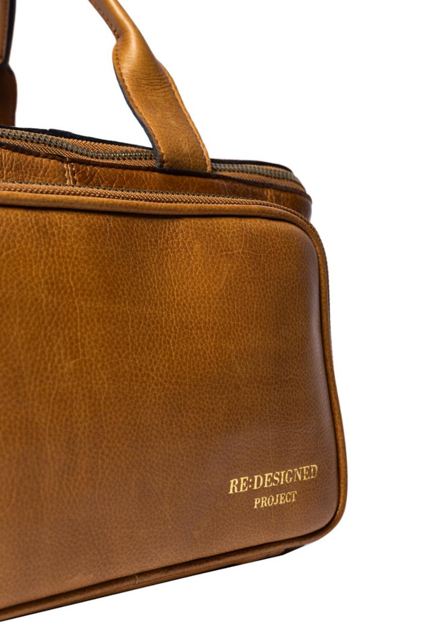 RE PROJECT 39 handcrafted Urban Leather knitting and crochet crossbody bag with top handles and front pocket from iDOKNiT