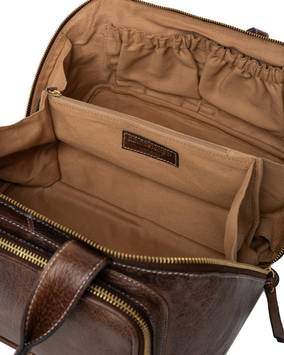 RE PROJECT 39 handcrafted Urban Leather knitting and crochet crossbody bag with top handles and front pocket from iDOKNiT