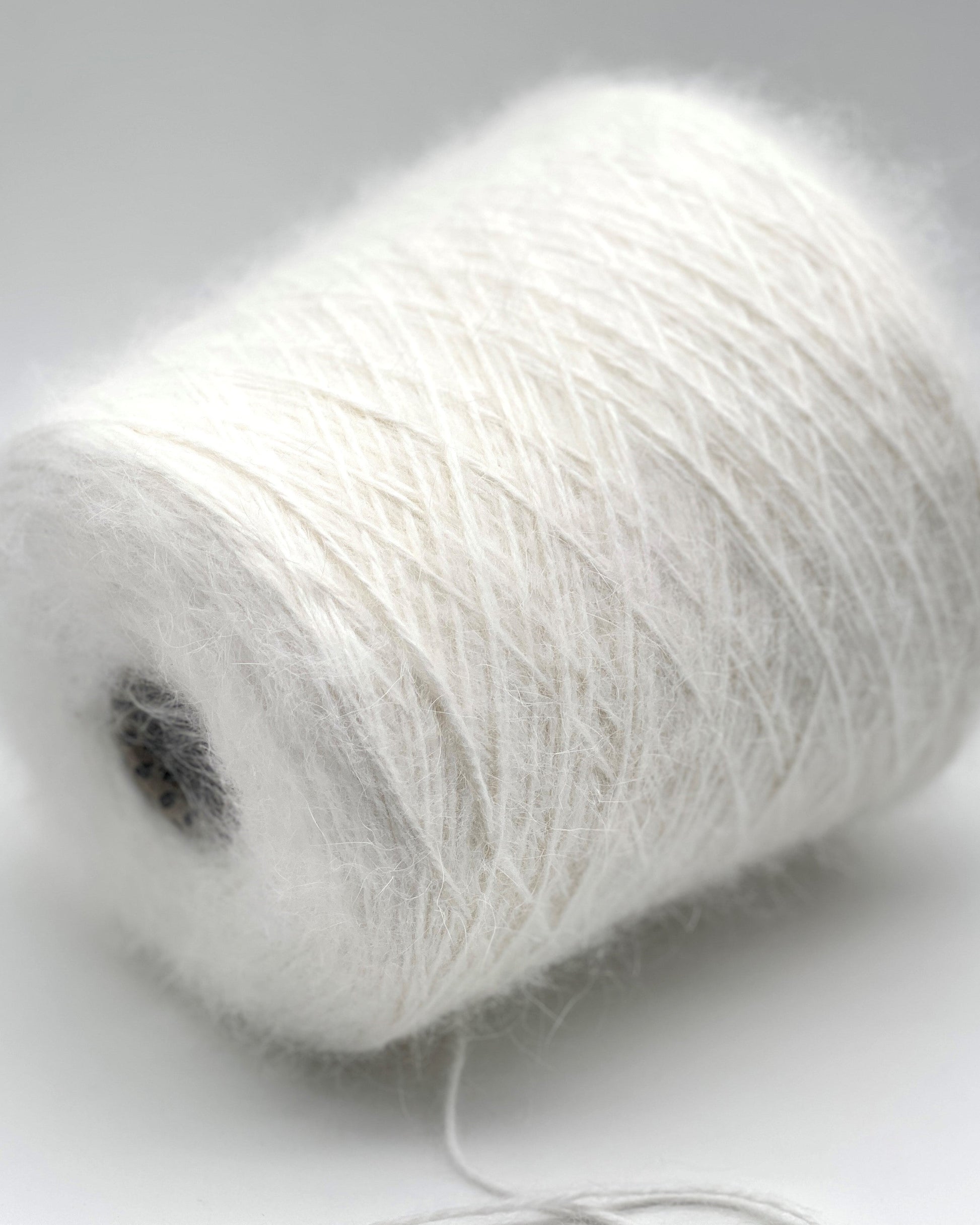 Italian Angora blend yarn by Biagioli Modesto with soft halo and lightweight texture, sport weight yarn for sweaters and accessories, sold by iDOKNiT