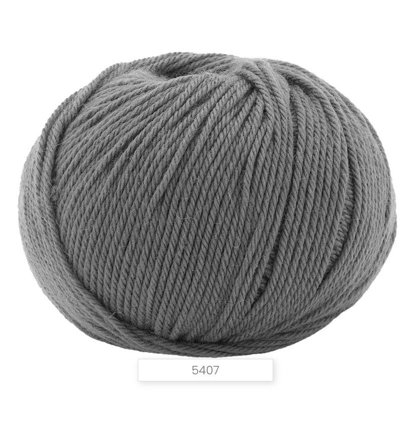 Gray skein of yarn on a white background