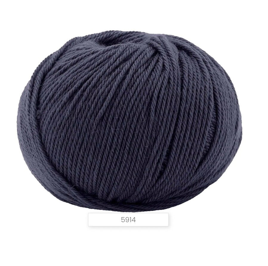 Navy blue ball of yarn on a white background
