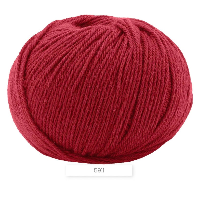 Red ball of yarn on a white background