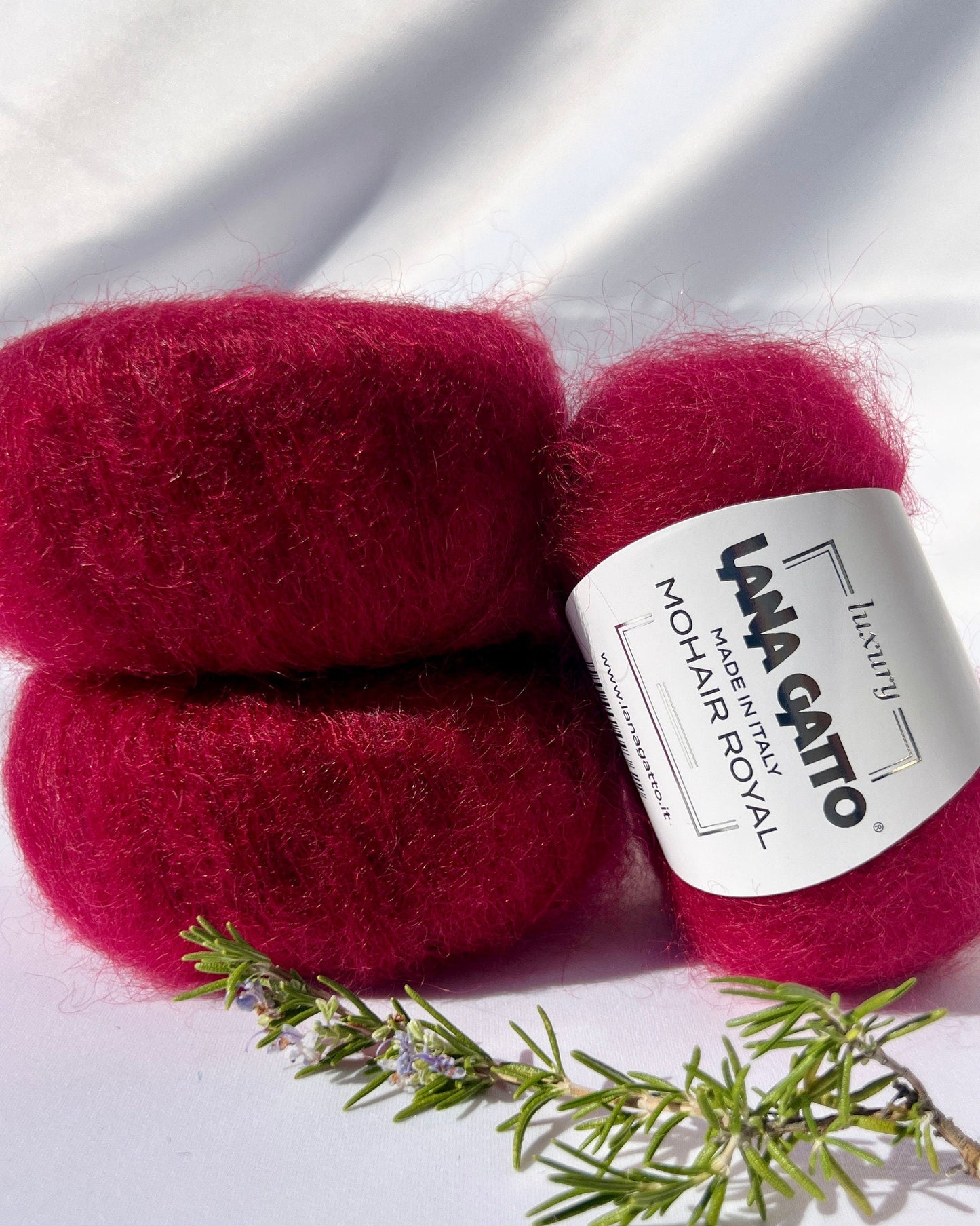 Close-up of iDOKNiT Lana Gatto MOHAIR ROYAL yarn, highlighting the delicate airy halo of Kid Mohair and Extrafine Merino blend in a 25g ball.