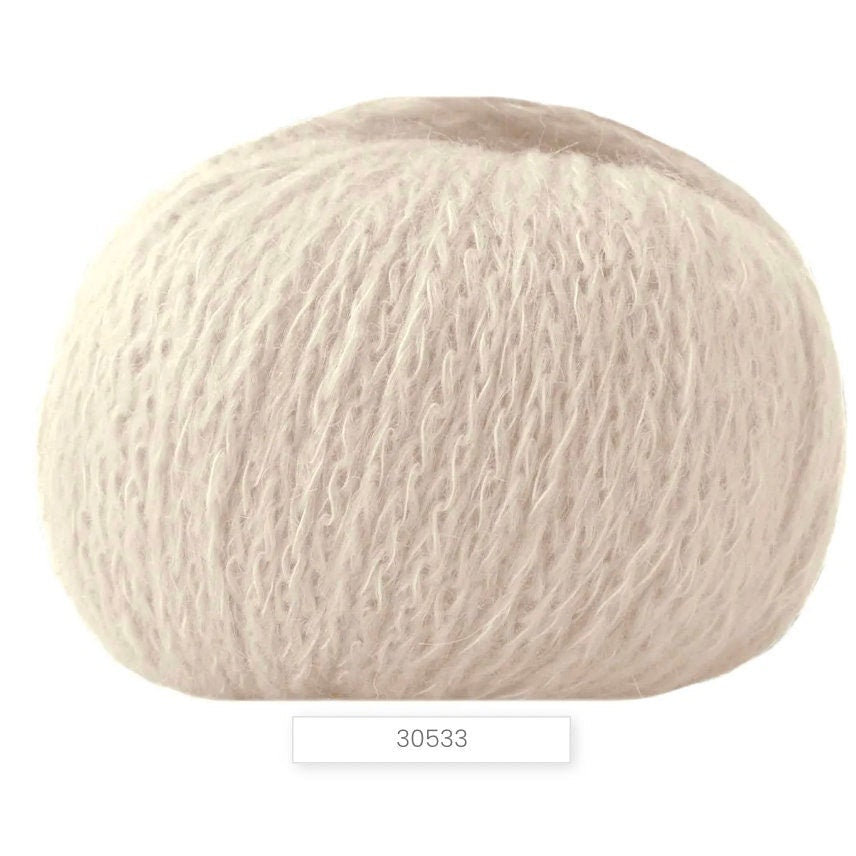 Beige yarn ball with a label '30533' on a white background