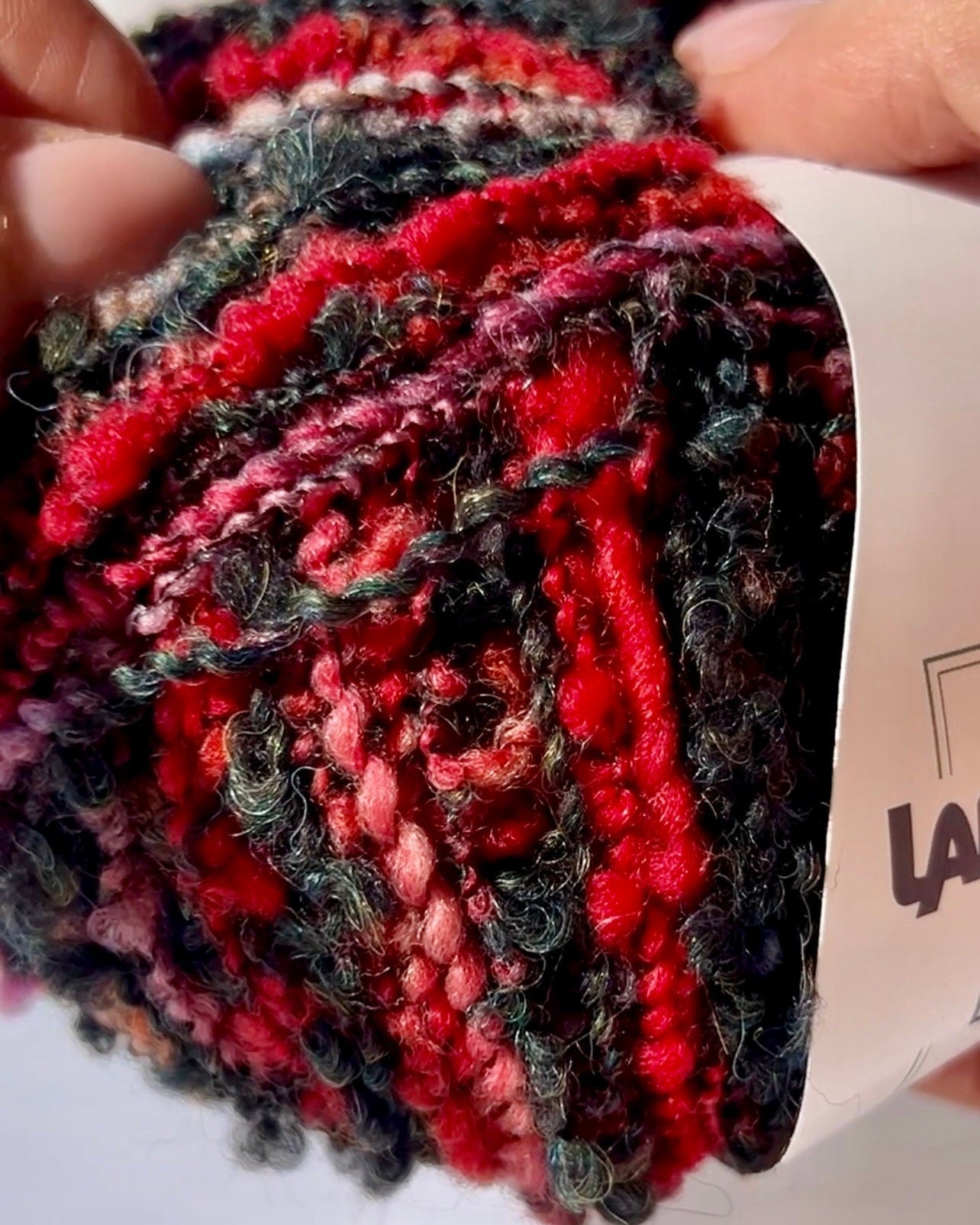 Lana Gatto BELLEVUE wool alpaca boucle yarn soft textured Italian DK yarn
BELLEVUE boucle yarn close up showing lumpy textured surface for knitwear
Italian wool alpaca nylon yarn BELLEVUE perfect for sweaters and scarves
Soft boucle yarn BELLEVUE ideal for cozy textured garments and accessories
Luxury Italian yarn BELLEVUE DK weight for modern knitwear projects