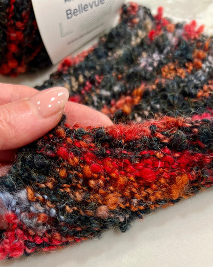 Lana Gatto BELLEVUE wool alpaca boucle yarn soft textured Italian DK yarn
BELLEVUE boucle yarn close up showing lumpy textured surface for knitwear
Italian wool alpaca nylon yarn BELLEVUE perfect for sweaters and scarves
Soft boucle yarn BELLEVUE ideal for cozy textured garments and accessories
Luxury Italian yarn BELLEVUE DK weight for modern knitwear projects