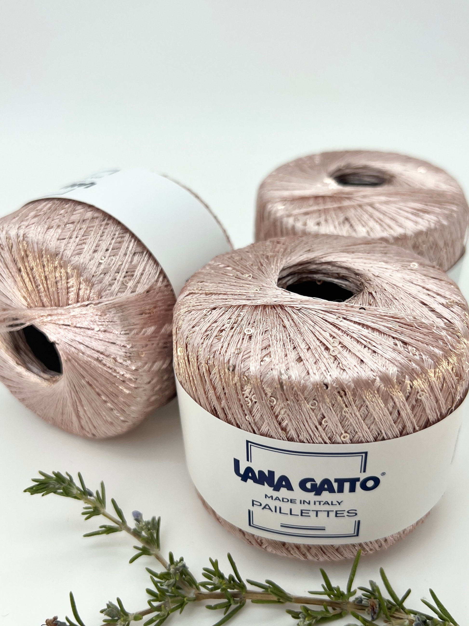 Lana Gatto Paillettes yarn in shimmering pastel tones, with delicate 2mm sequins, lightweight polyester yarn ideal for adding sparkle to knit or crochet projects. Made in Italy. 8933 rosa color.