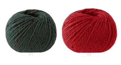 Close-up of iDOKNiT Lana Gatto EVEREST tweed yarn, showing the rustic texture of the Merino and Viscose blend with signature colorful neps in a 50g ball.