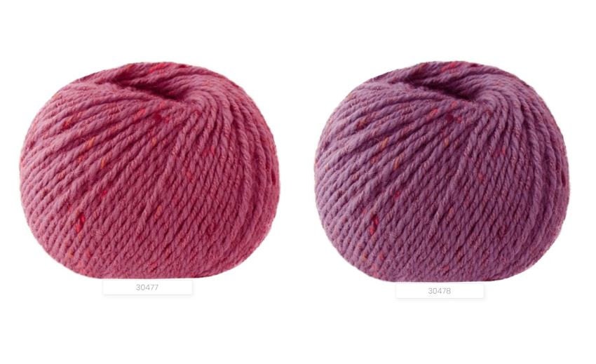 Close-up of iDOKNiT Lana Gatto EVEREST tweed yarn, showing the rustic texture of the Merino and Viscose blend with signature colorful neps in a 50g ball.