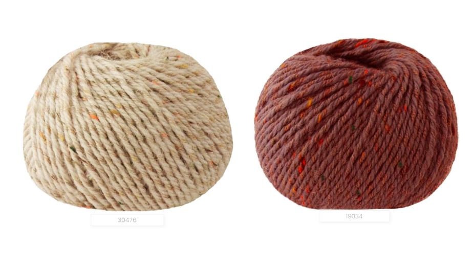 Close-up of iDOKNiT Lana Gatto EVEREST tweed yarn, showing the rustic texture of the Merino and Viscose blend with signature colorful neps in a 50g ball.