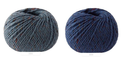 Close-up of iDOKNiT Lana Gatto EVEREST tweed yarn, showing the rustic texture of the Merino and Viscose blend with signature colorful neps in a 50g ball.