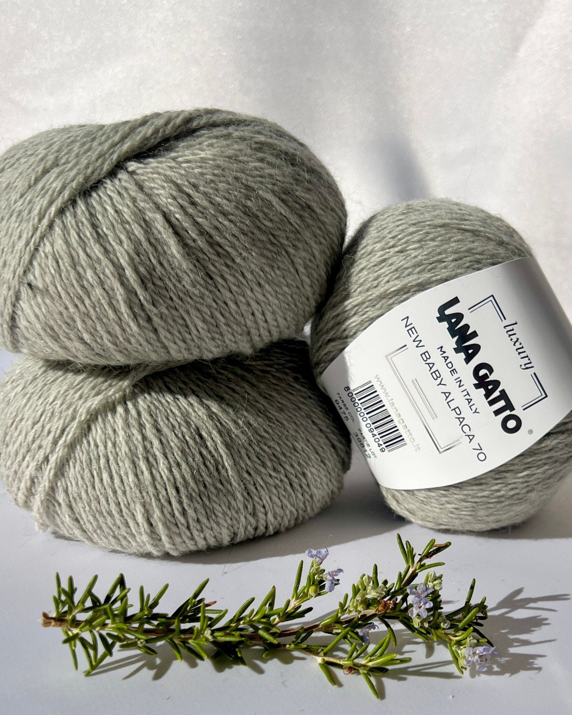 Luxurious iDOKNiT Italian yarn blend of 70% Baby Alpaca and 30% Extrafine Merino Wool in DK weight, featuring a soft halo and plush texture for elegant knitwear.