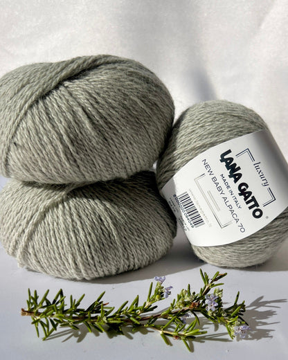 Luxurious iDOKNiT Italian yarn blend of 70% Baby Alpaca and 30% Extrafine Merino Wool in DK weight, featuring a soft halo and plush texture for elegant knitwear.