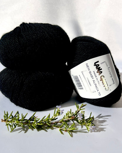 Luxurious iDOKNiT Italian yarn blend of 70% Baby Alpaca and 30% Extrafine Merino Wool in DK weight, featuring a soft halo and plush texture for elegant knitwear.