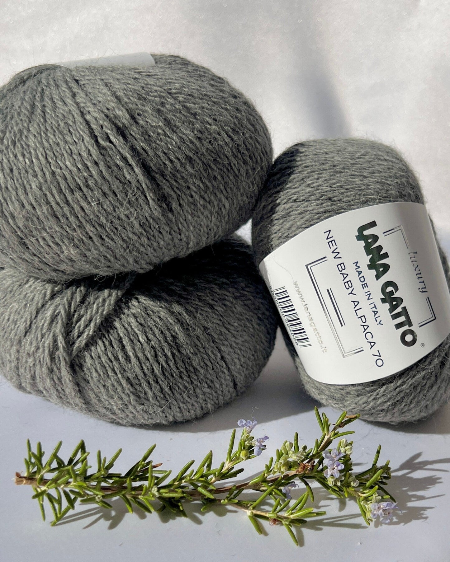 Luxurious iDOKNiT Italian yarn blend of 70% Baby Alpaca and 30% Extrafine Merino Wool in DK weight, featuring a soft halo and plush texture for elegant knitwear.