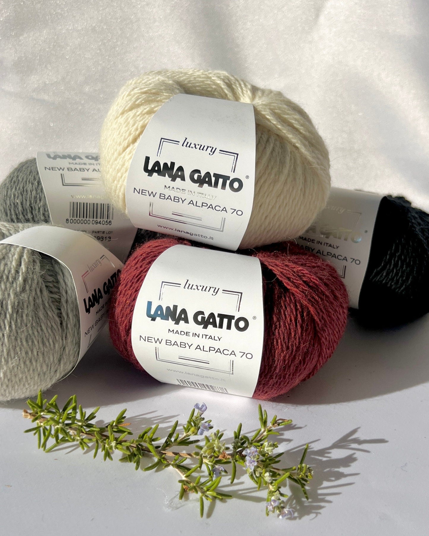 Luxurious iDOKNiT Italian yarn blend of 70% Baby Alpaca and 30% Extrafine Merino Wool in DK weight, featuring a soft halo and plush texture for elegant knitwear.