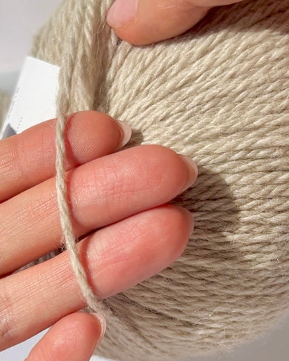 Luxurious iDOKNiT Italian yarn blend of 70% Baby Alpaca and 30% Extrafine Merino Wool in DK weight, featuring a soft halo and plush texture for elegant knitwear.