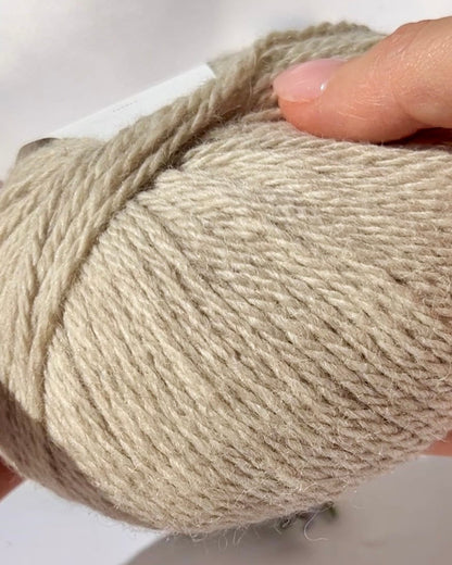Luxurious iDOKNiT Italian yarn blend of 70% Baby Alpaca and 30% Extrafine Merino Wool in DK weight, featuring a soft halo and plush texture for elegant knitwear.