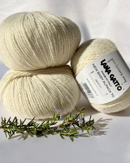 Luxurious iDOKNiT Italian yarn blend of 70% Baby Alpaca and 30% Extrafine Merino Wool in DK weight, featuring a soft halo and plush texture for elegant knitwear.
