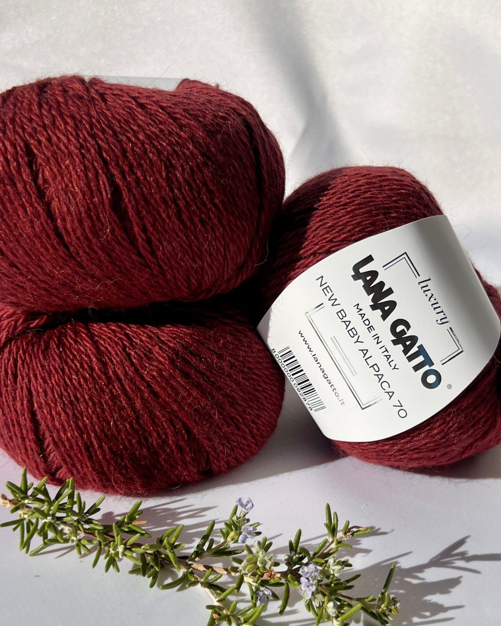 Luxurious iDOKNiT Italian yarn blend of 70% Baby Alpaca and 30% Extrafine Merino Wool in DK weight, featuring a soft halo and plush texture for elegant knitwear.