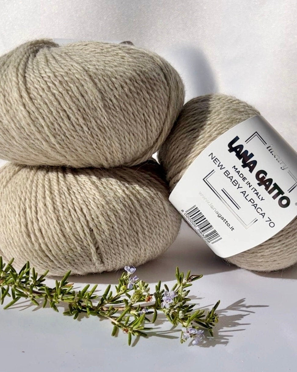 Luxurious iDOKNiT Italian yarn blend of 70% Baby Alpaca and 30% Extrafine Merino Wool in DK weight, featuring a soft halo and plush texture for elegant knitwear.