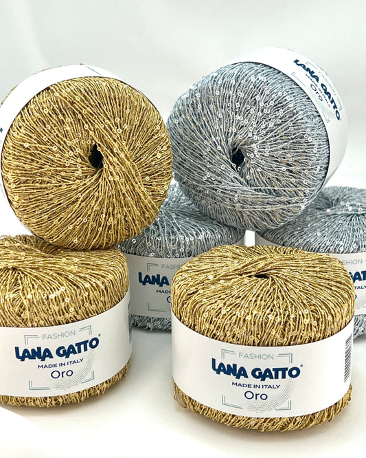 Yarn balls with 'Lana Gatto' labels on a white background