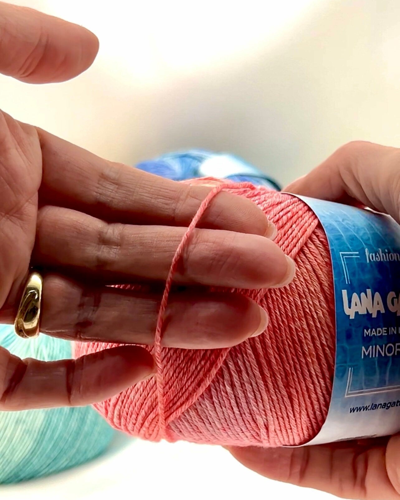 Luxury Italian designer yarn collection for iDOKNiT, featuring premium natural fibers on cones for professional hand-knit and machine-knitting projects.