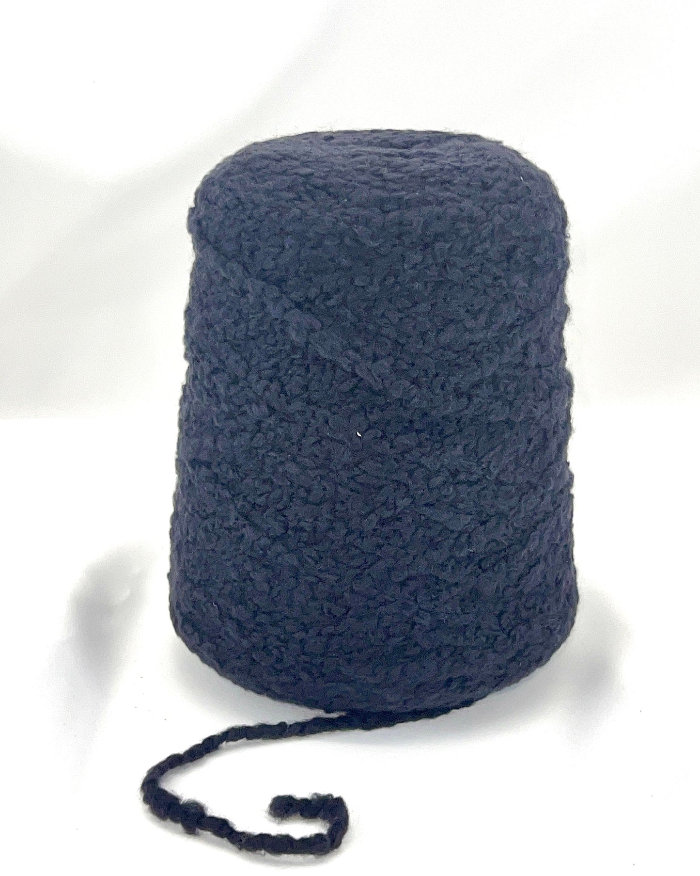 Blue skein of yarn on a white background
