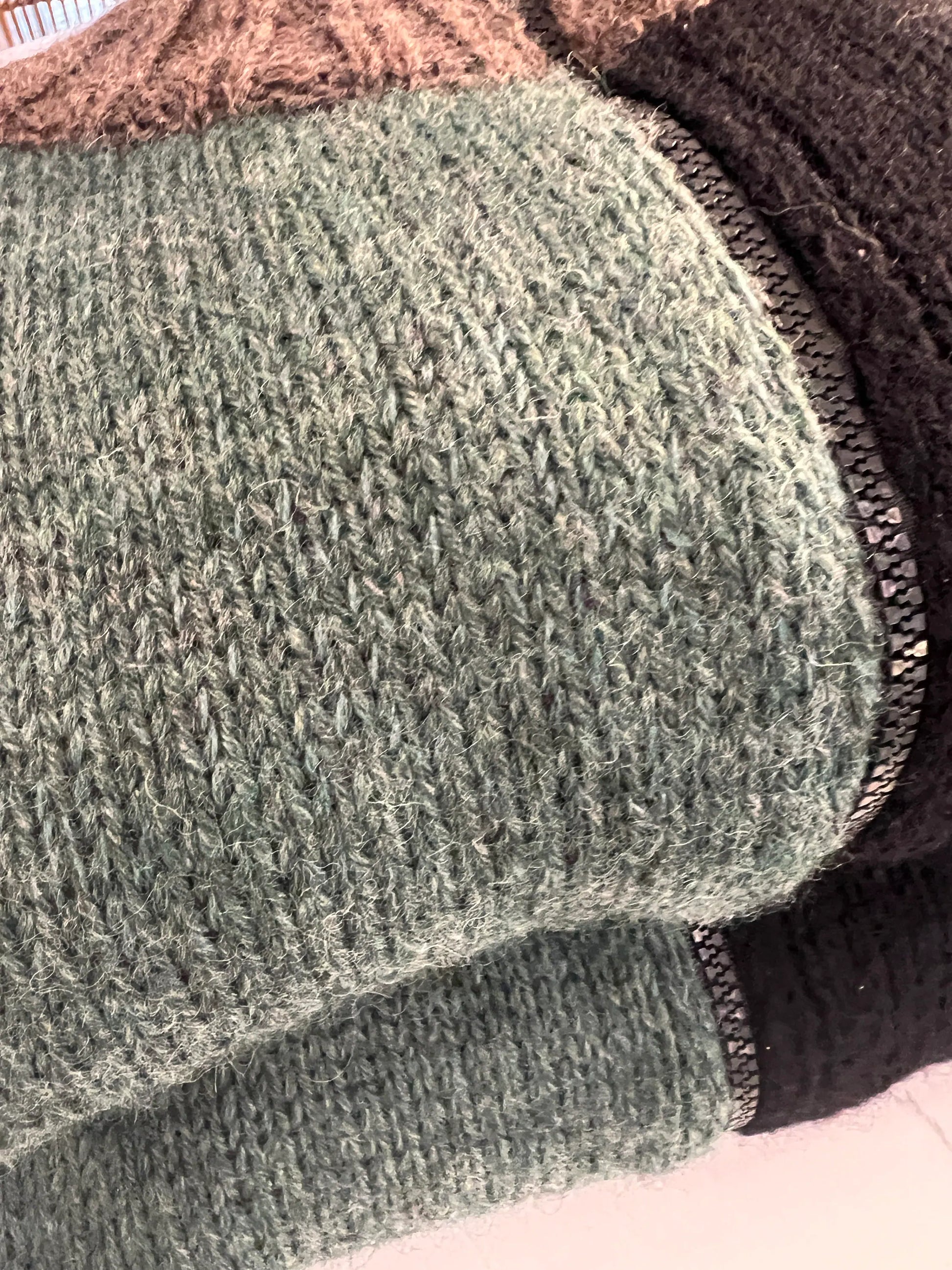 Close-up of green fabric with a textured pattern