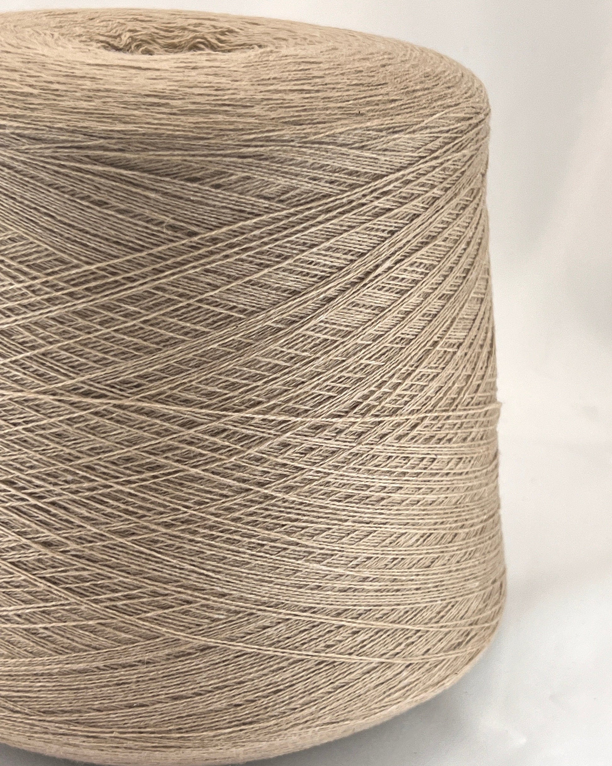 Cashmere merino yarn LEGEND 70 luxury Italian lace weight yarn
Soft Italian cashmere merino yarn cone for sweaters and shawls
Luxury lace weight yarn made from cashmere and merino wool
Italian cashmere merino knitting yarn close up texture detail
Luxury Italian yarn for heirloom knitwear and weaving