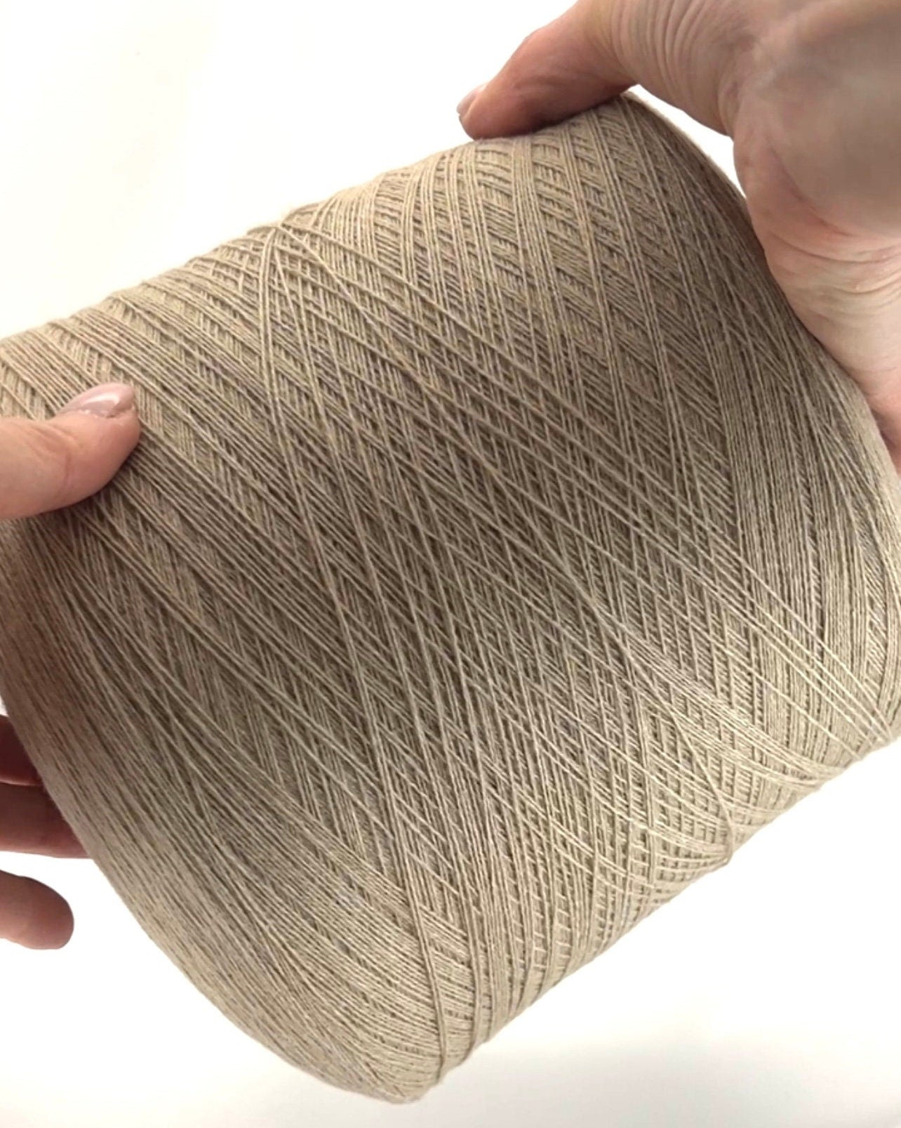 Cashmere merino yarn LEGEND 70 luxury Italian lace weight yarn
Soft Italian cashmere merino yarn cone for sweaters and shawls
Luxury lace weight yarn made from cashmere and merino wool
Italian cashmere merino knitting yarn close up texture detail
Luxury Italian yarn for heirloom knitwear and weaving