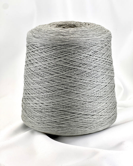 Gray spool of yarn on a white background