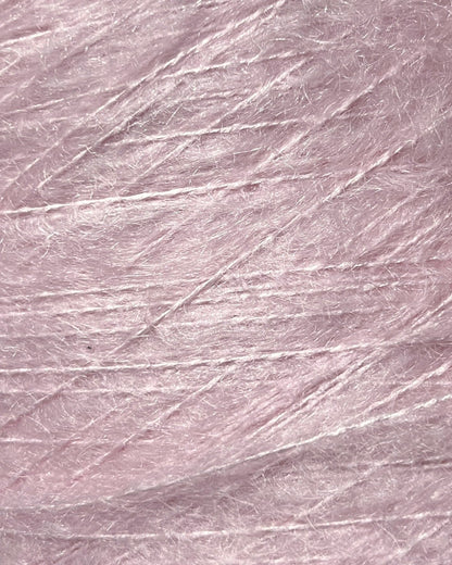 Close-up of a textured pink fabric surface