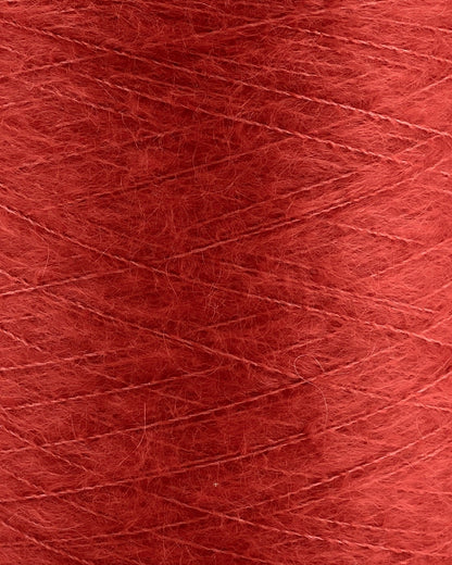 Close-up of red yarn with visible texture