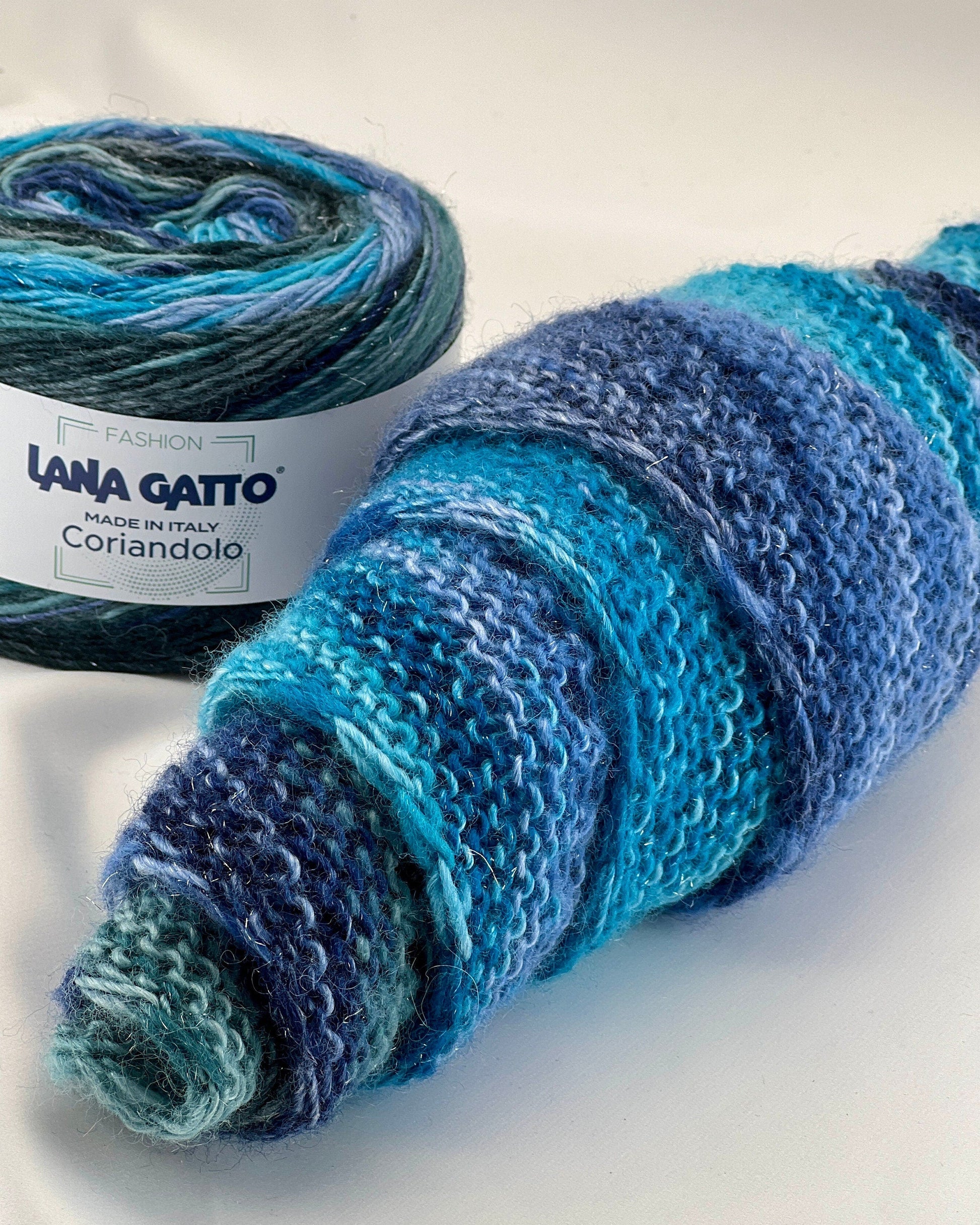 Lana Gatto Coriandolo Glitter yarn multicolor wool lurex shimmer Italian yarn 300m
Italian wool glitter yarn soft gradient Coriandolo Lana Gatto sparkle yarn
Luxury wool lurex yarn multicolor gradient soft knitting yarn Italy
Coriandolo glitter yarn close-up texture soft wool with shimmer thread
Multicolor Italian yarn wool blend with lurex sparkle for scarves and shawls