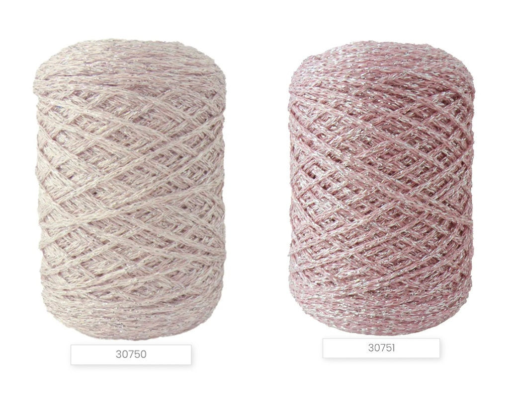Luxury Italian designer yarn collection for iDOKNiT, featuring premium natural fibers on cones for professional hand-knit and machine-knitting projects.