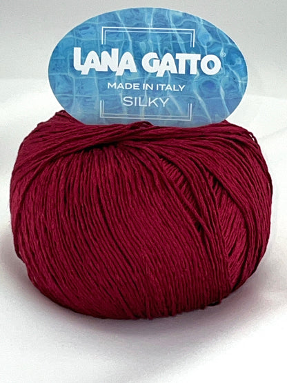 Lana Gatto SILKY pure silk yarn Italian fingering yarn
Luxury silk yarn for elegant summer knitwear and shawls
Close up of SILKY yarn showing smooth plied silk texture
Italian pure silk yarn with elegant sheen and drape
Soft breathable silk yarn for luxury knitting projects