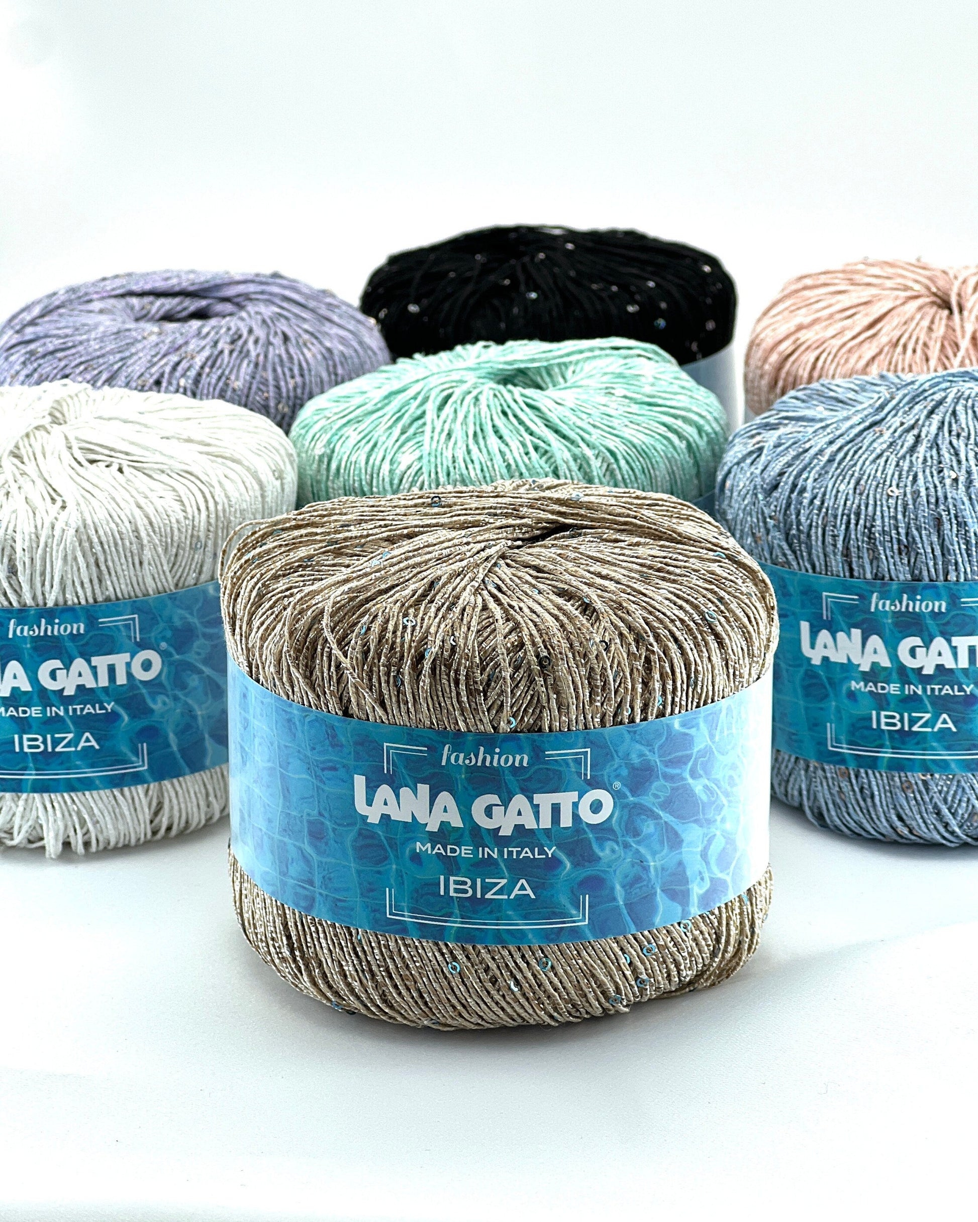 Lana Gatto IBIZA lurex cotton paillettes yarn with elegant sparkle
Italian fingering yarn IBIZA with micro sequins and metallic accents
Lana Gatto IBIZA summer yarn showing light-catching shimmer and texture
Lurex cotton paillettes yarn for beachwear summer tops and shawls
Luxury Italian IBIZA yarn for statement accessories and warm-weather knitwear