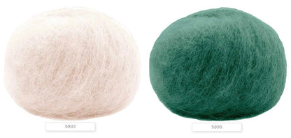 Close-up of iDOKNiT Lana Gatto MOHAIR ROYAL yarn, highlighting the delicate airy halo of Kid Mohair and Extrafine Merino blend in a 25g ball.