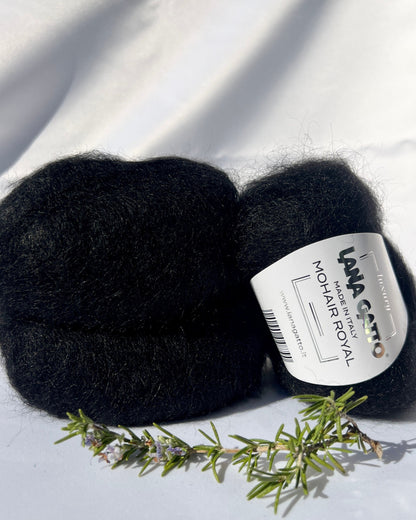 Close-up of iDOKNiT Lana Gatto MOHAIR ROYAL yarn, highlighting the delicate airy halo of Kid Mohair and Extrafine Merino blend in a 25g ball.