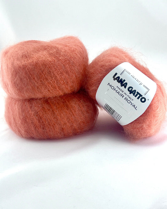 Close-up of iDOKNiT Lana Gatto MOHAIR ROYAL yarn, highlighting the delicate airy halo of Kid Mohair and Extrafine Merino blend in a 25g ball.