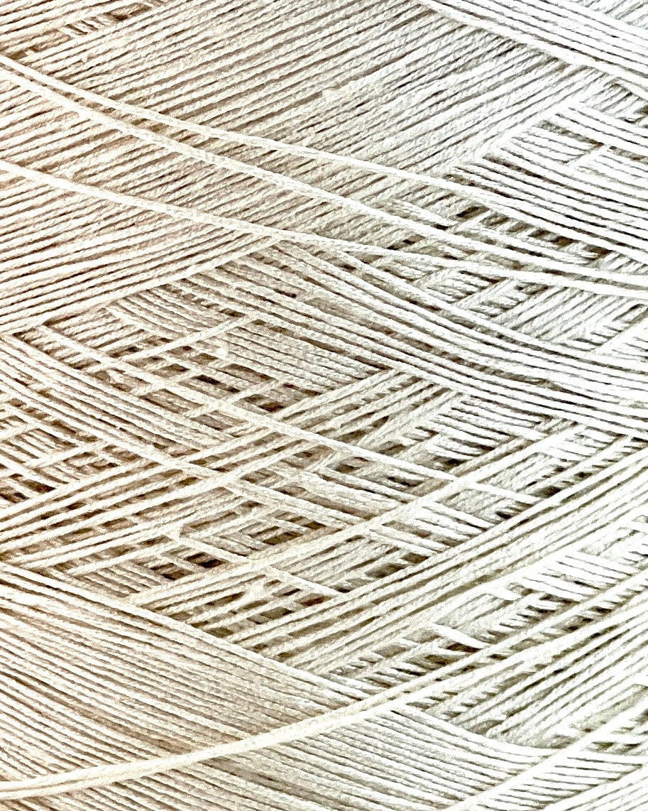 Luxury Italian silk shappe yarn Ri.Go SETA SHAPPE close up texture
100 percent silk lace yarn for shawls scarves and weaving
Italian silk yarn with soft luminous finish and elegant drape
Ri.Go SETA SHAPPE lace weight silk yarn for crochet and knitwear
Silk shappe yarn made in Italy for refined luxury garments
