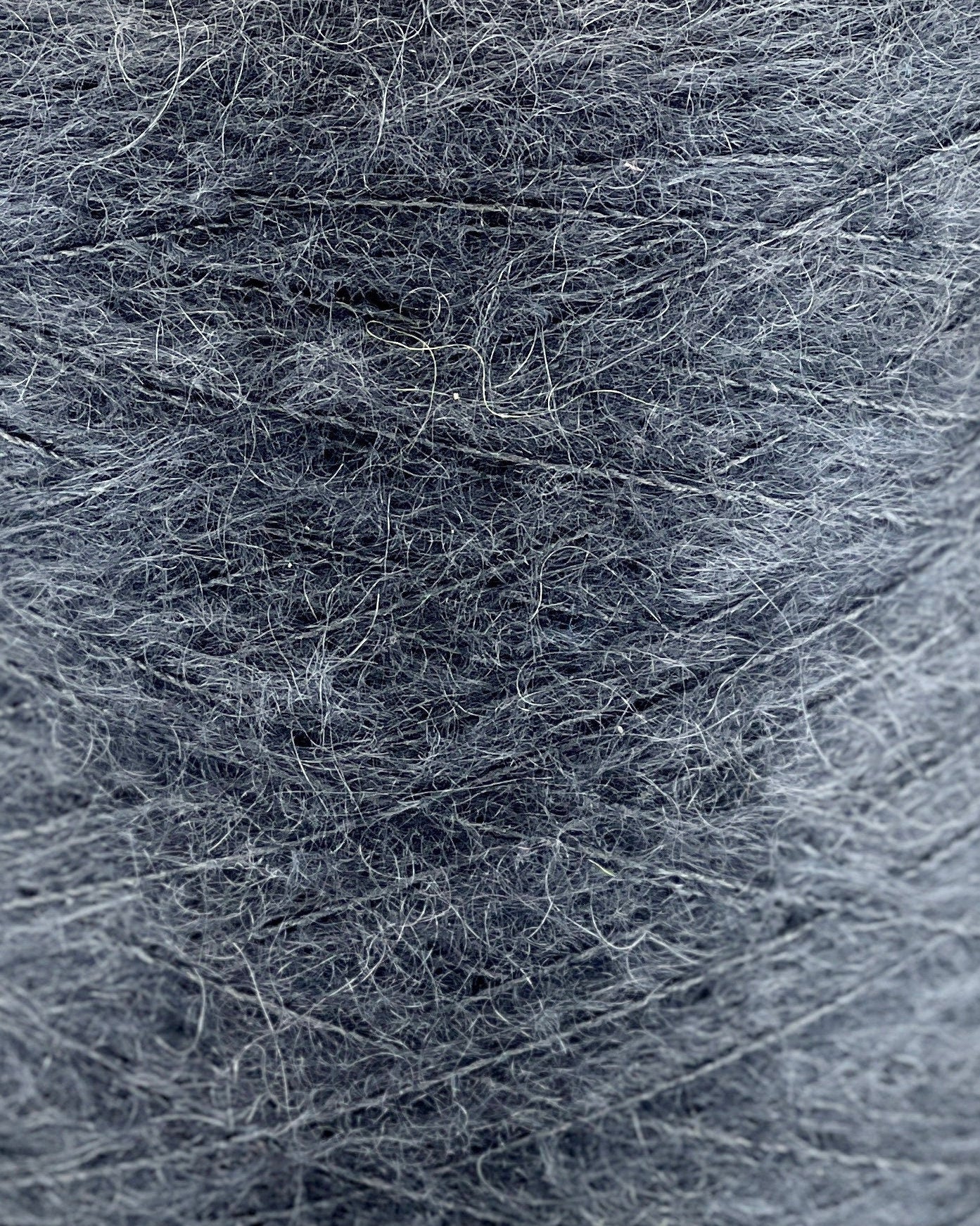 Close-up of gray fibers with a textured surface
