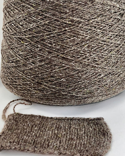 Cariaggi NEW HARRIS cashmere tweed yarn cone Italy
100 percent cashmere tweed yarn taupe melange with green flecks
Luxury Italian cashmere tweed yarn for sweaters scarves and shawls
soft fingering weight cashmere yarn texture close up
Cariaggi NEW HARRIS luxury yarn 400m per 100g