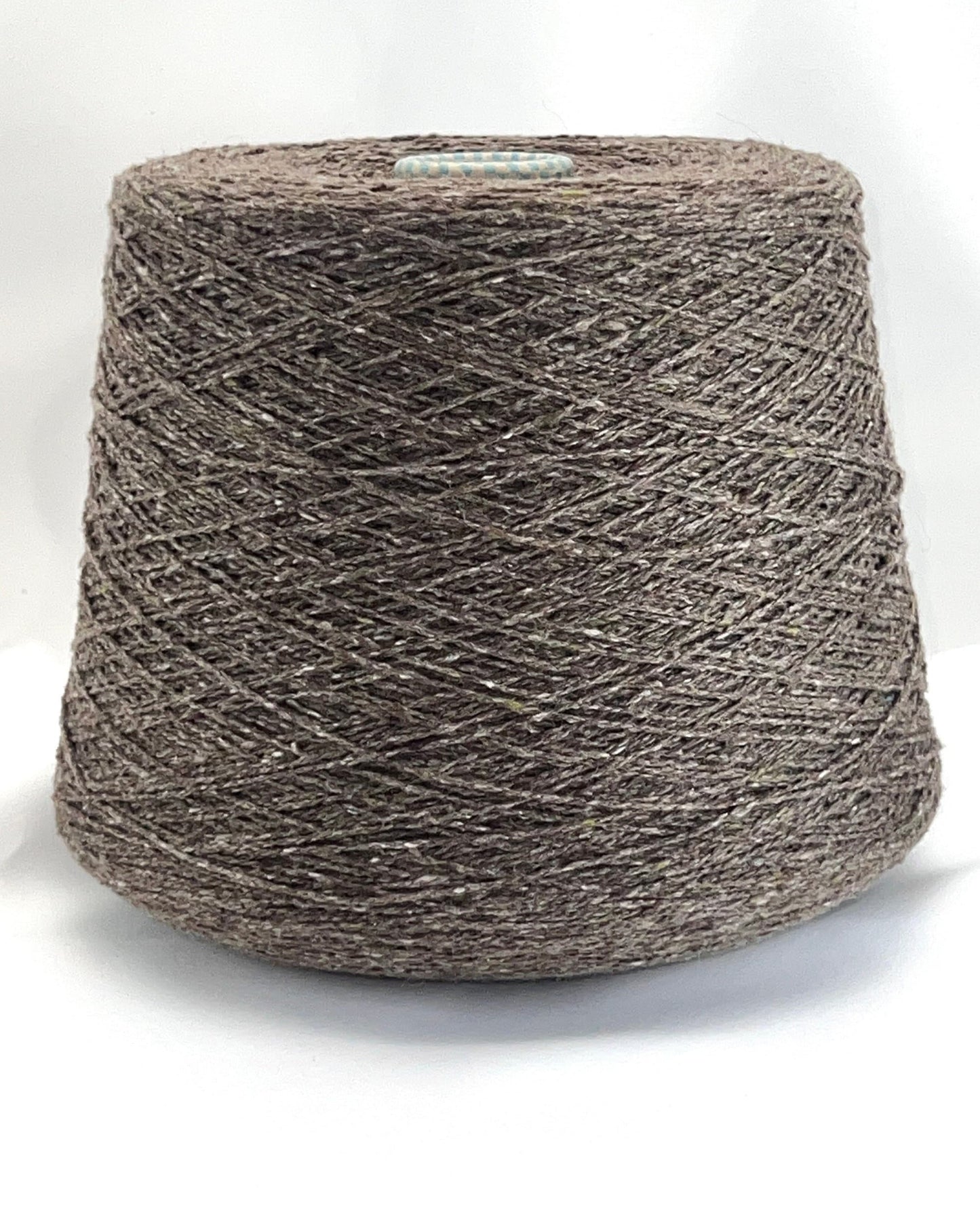 Cariaggi NEW HARRIS cashmere tweed yarn cone Italy
100 percent cashmere tweed yarn taupe melange with green flecks
Luxury Italian cashmere tweed yarn for sweaters scarves and shawls
soft fingering weight cashmere yarn texture close up
Cariaggi NEW HARRIS luxury yarn 400m per 100g