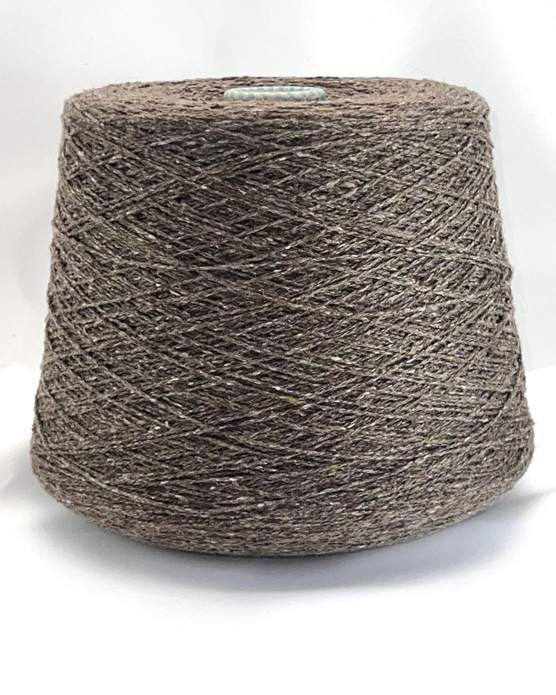Cariaggi NEW HARRIS cashmere tweed yarn cone Italy
100 percent cashmere tweed yarn taupe melange with green flecks
Luxury Italian cashmere tweed yarn for sweaters scarves and shawls
soft fingering weight cashmere yarn texture close up
Cariaggi NEW HARRIS luxury yarn 400m per 100g