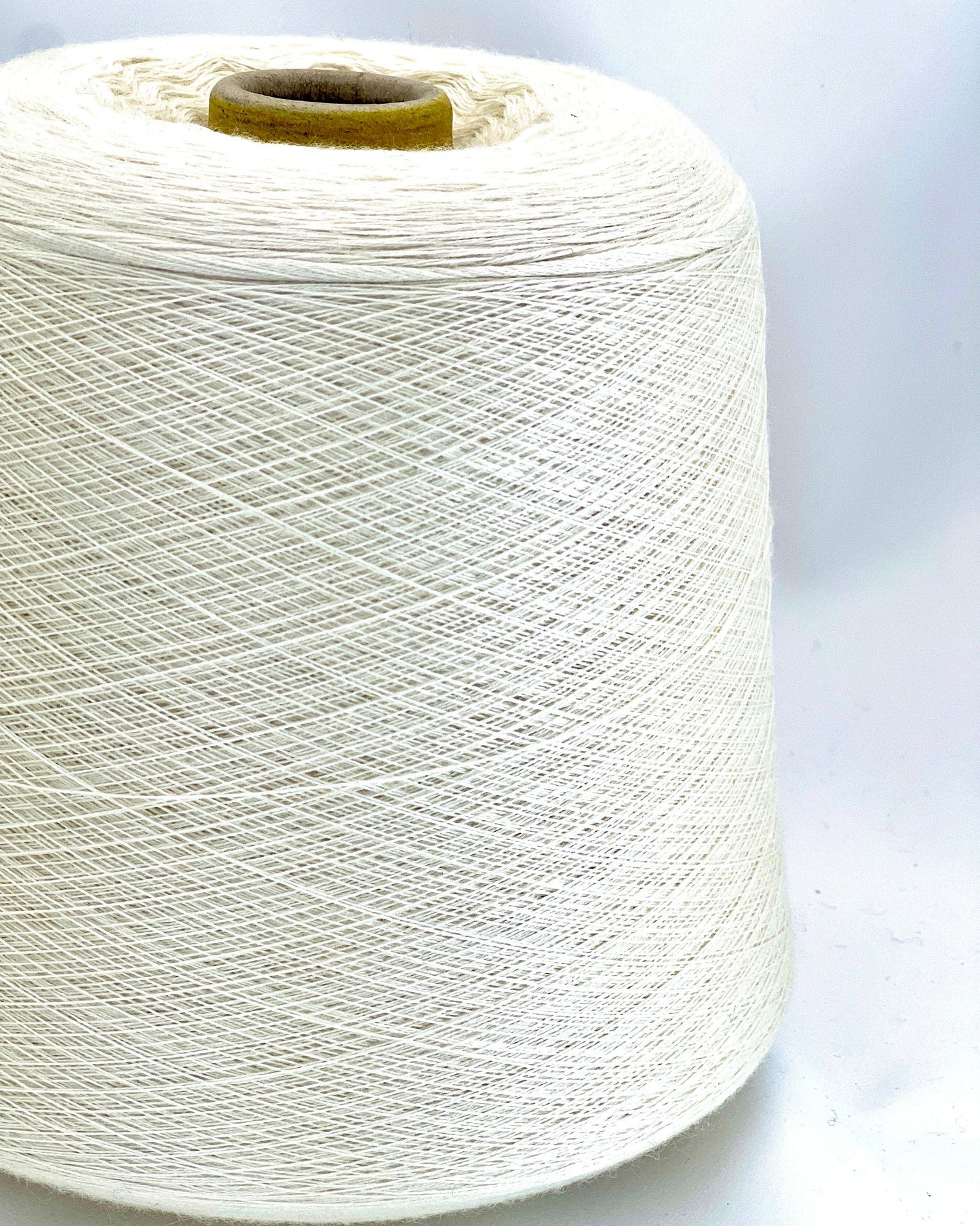Luxury cashmere silk yarn CASH SETA from an exclusive Italian mill
Fine lace-weight cashmere silk yarn in off-white color
Italian cashmere silk cone yarn with exceptional meterage
Luxury knitting yarn for shawls, sweaters, and weaving
Cashmere silk lace yarn with elegant drape and softness