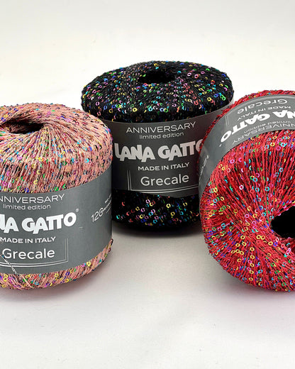 Three skeins of colorful yarn with 'Lana Gatto' labels on a white background