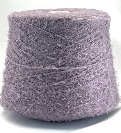 Spool of purple yarn on a white background